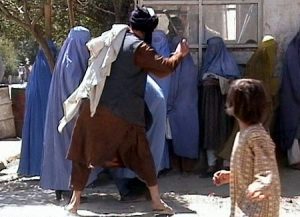 Taliban_beating_woman_in_public_
